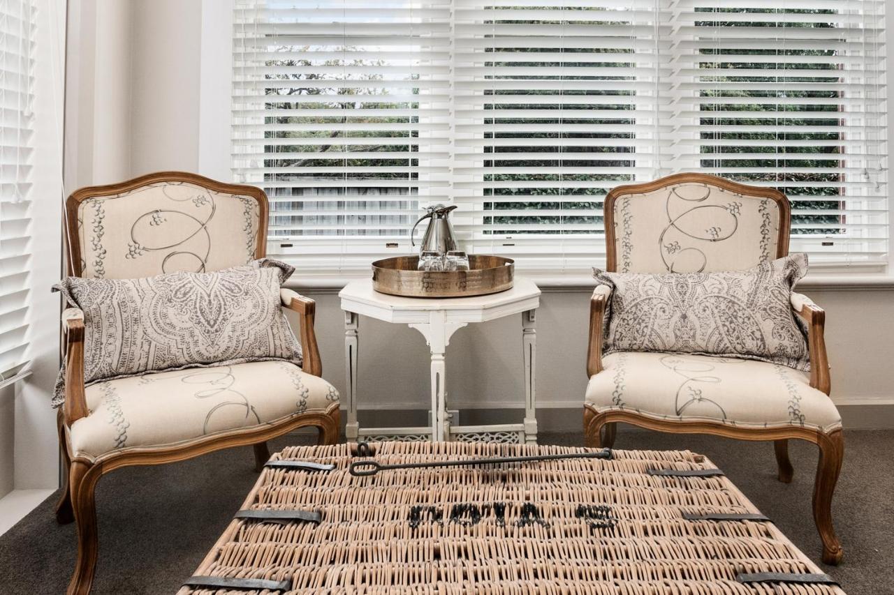 The Rivulet Bed & Breakfast Sandy Bay Exterior photo A set of plantation shutters